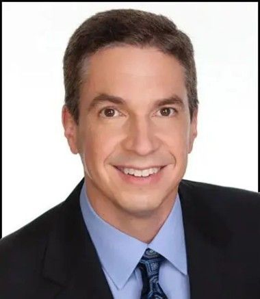 Dr. Wilfred Aguila